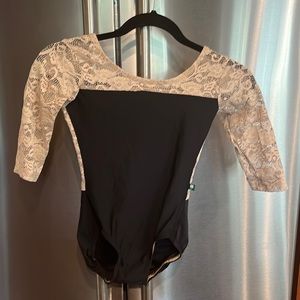 Black and nude lace Luckyleo.  Like new.
